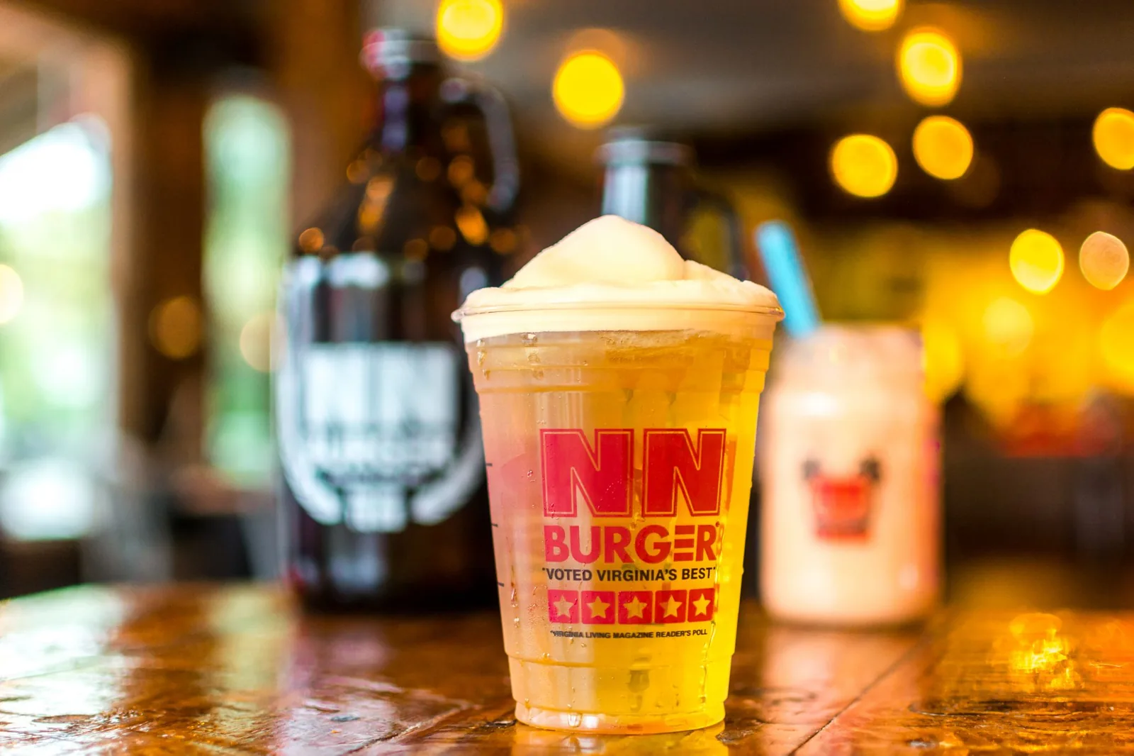 Frosty mug of craft beer with a thick foam head at NN Burger