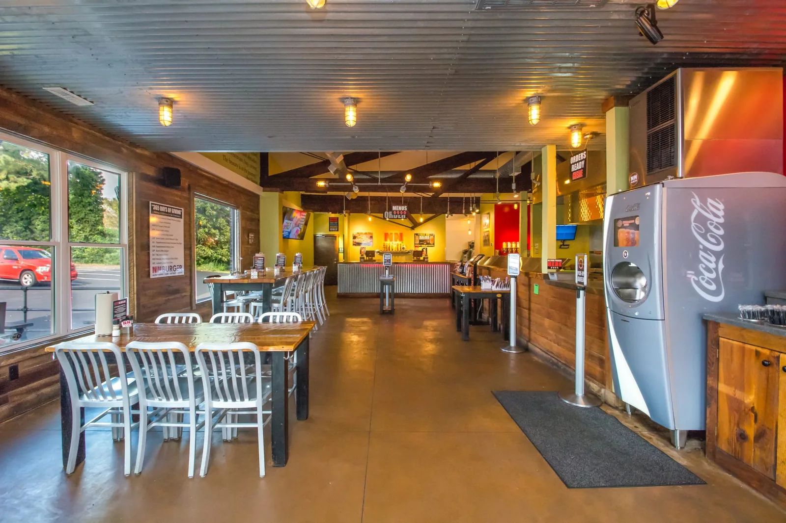 NN Burger dining room with corrugated metal ceiling