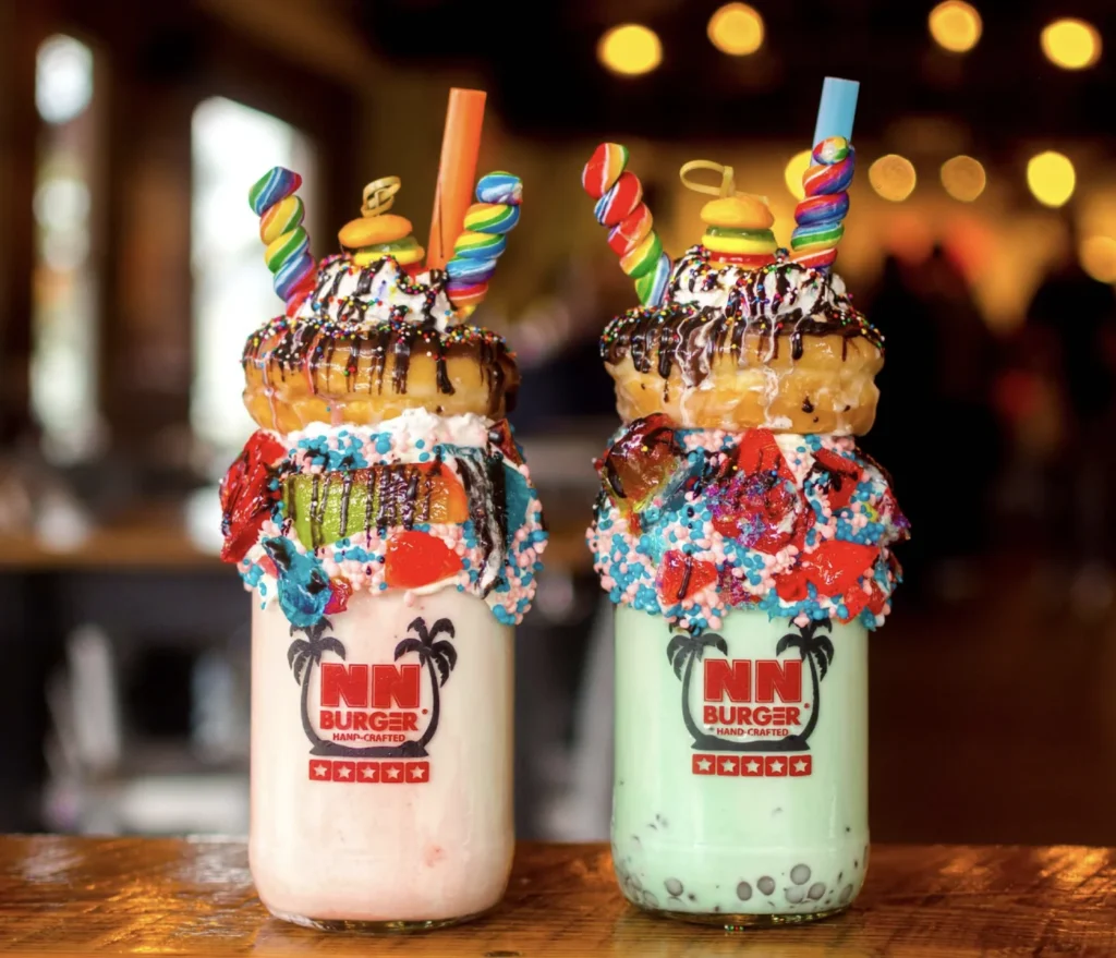 Two Freakshakes loaded with toppings